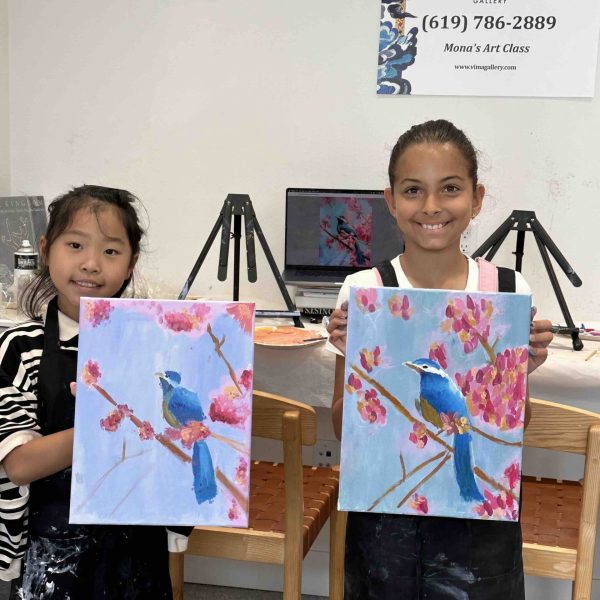 Home 12 Children holding colorful blue bird acrylic paintings during a kids art class at VIMA Gallery in San Diego